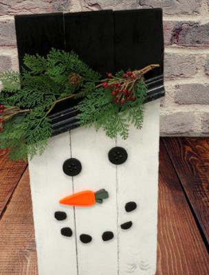 Snowmen with greenery 