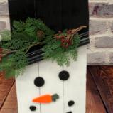 Snowmen with greenery 